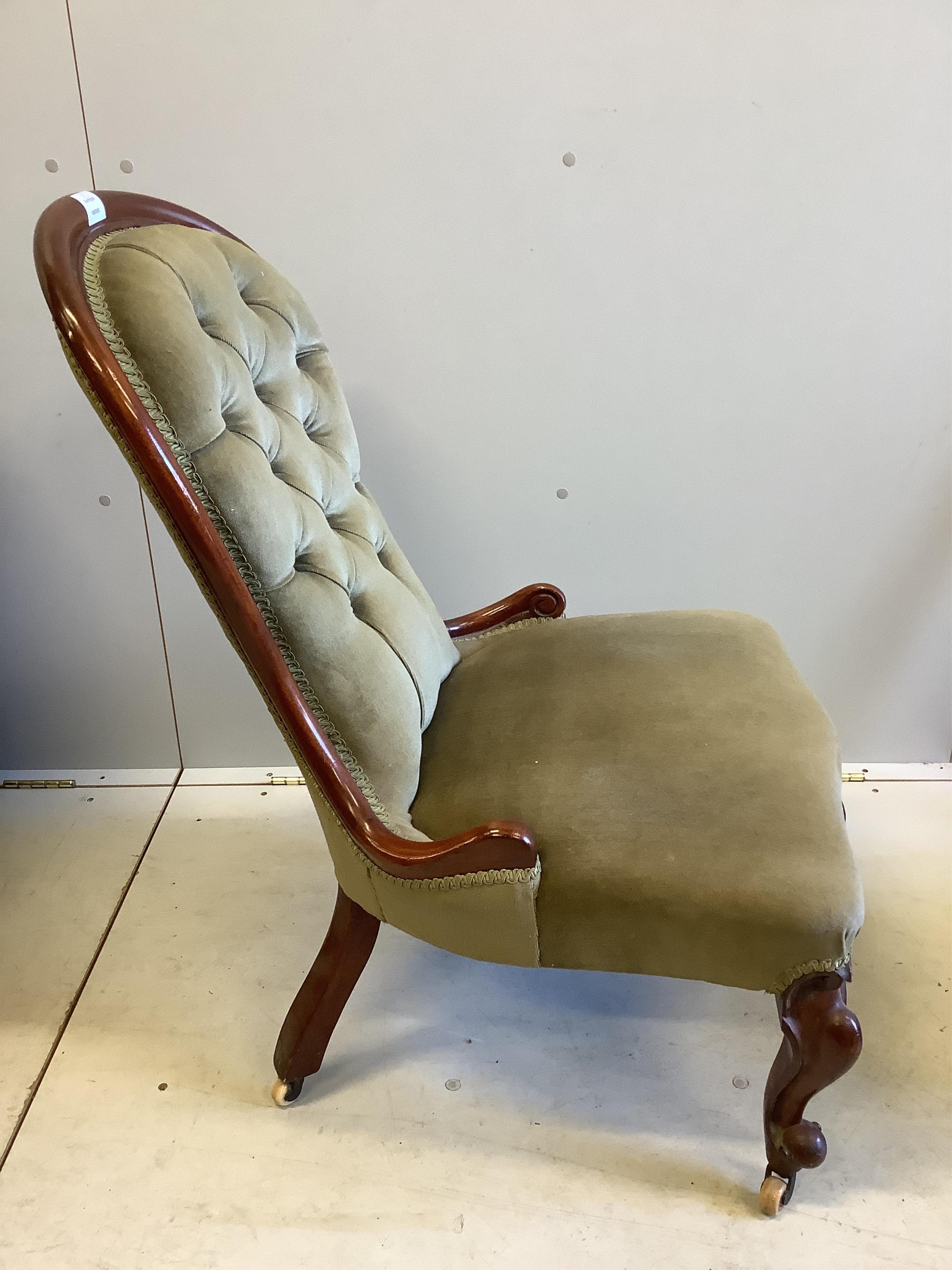 A Victorian mahogany spoon back nursing chair, width 60cm, depth 48cm, height 90cm. Condition - good